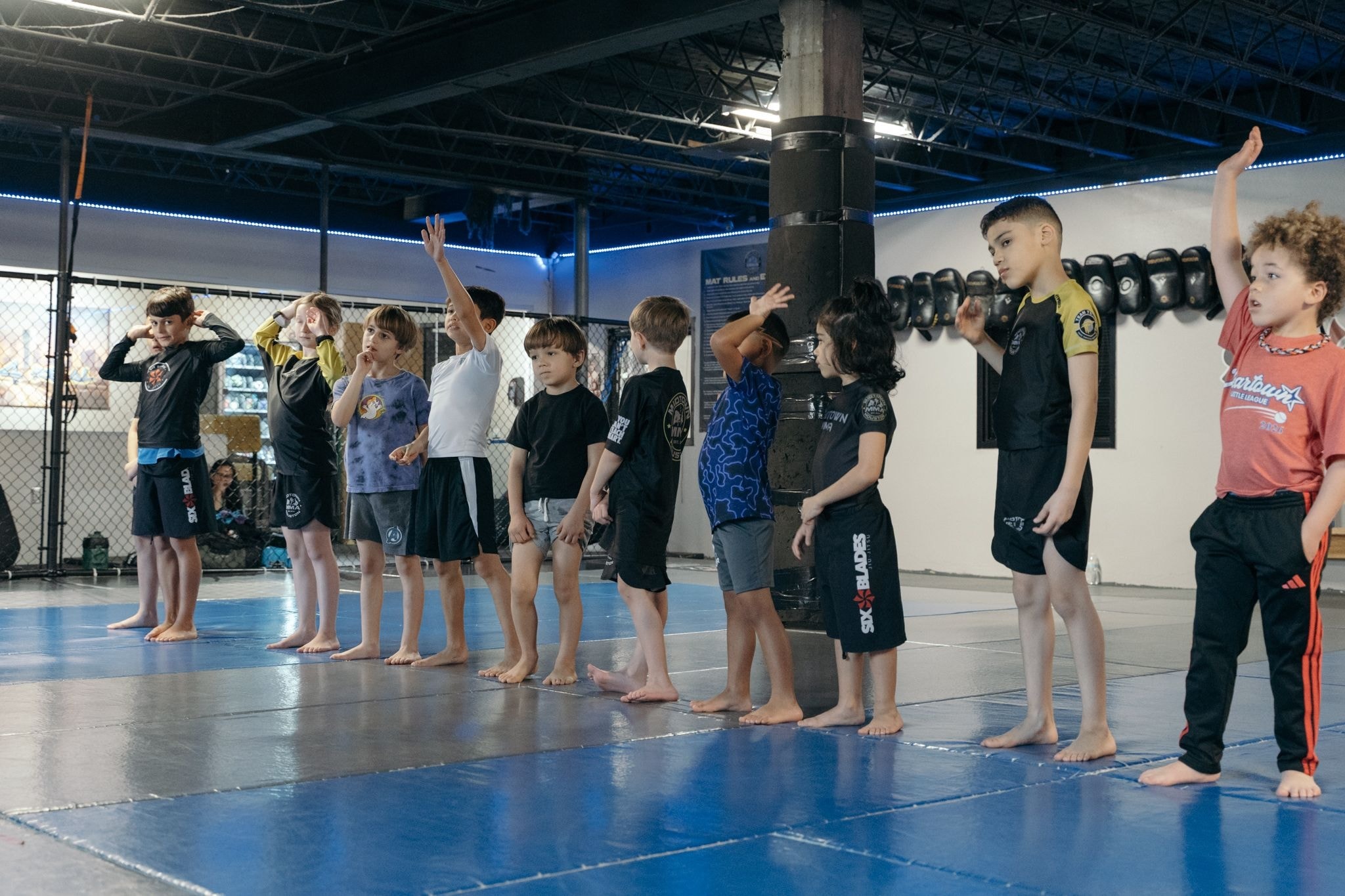 Kids BJJ training at Midtown MMA Houston — photo 1